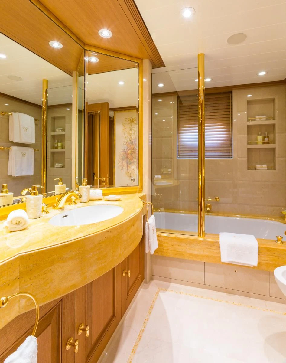 a bathroom with a shower and sink aboard NECTAR Yacht for Sale