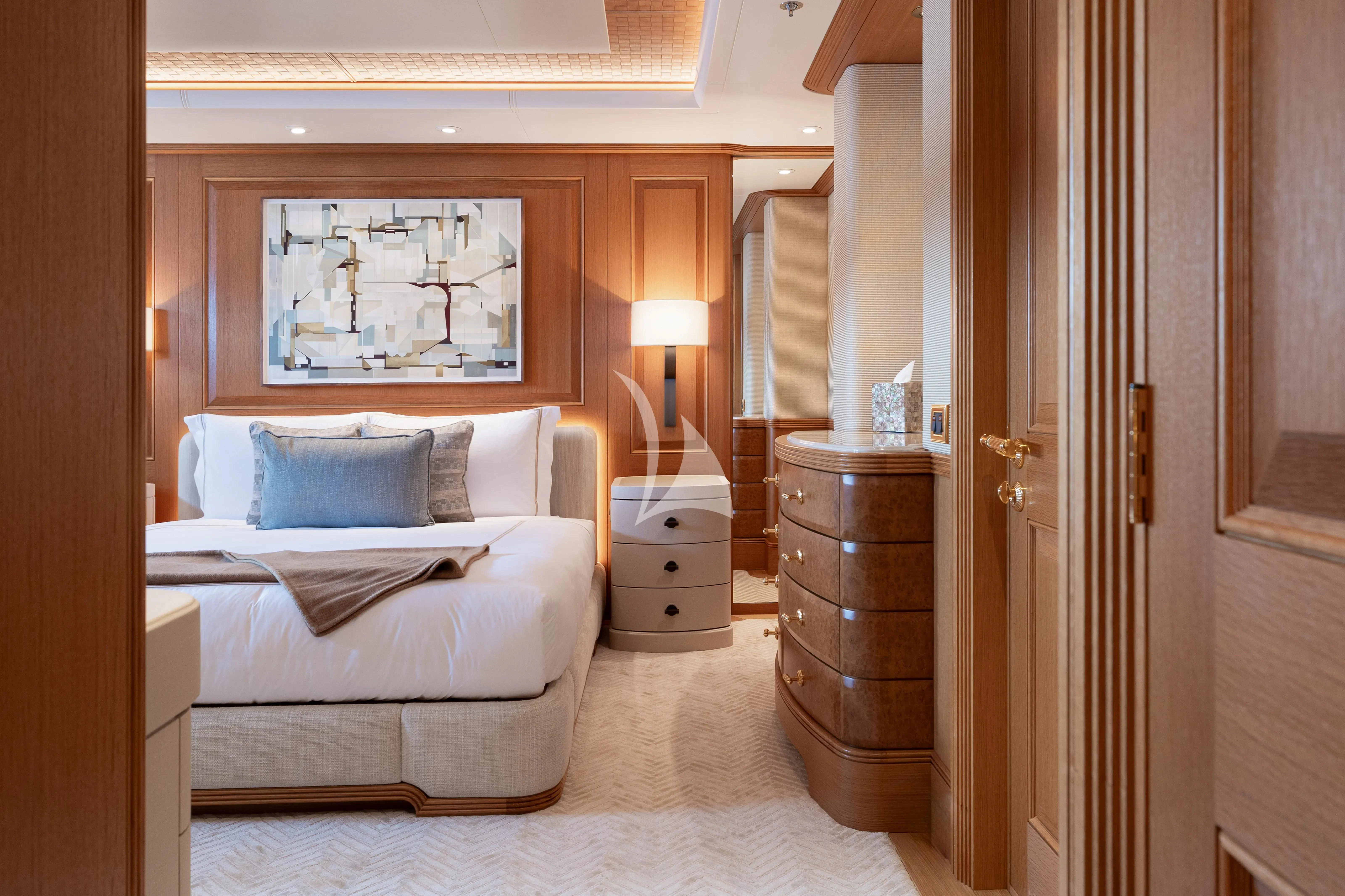 a bedroom with a bed and a mirror aboard NECTAR Yacht for Sale