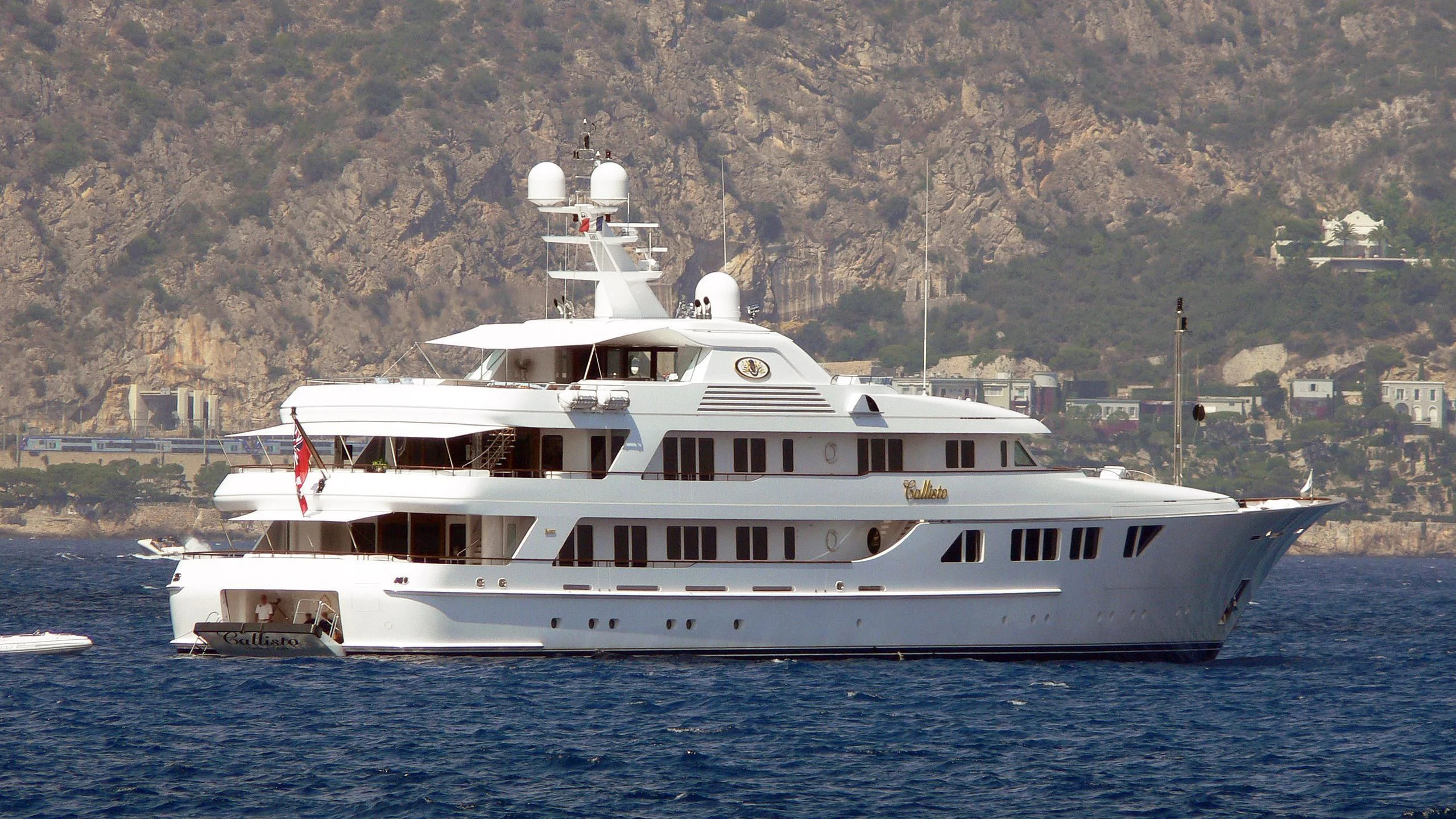 a large white boat in the water aboard NECTAR Yacht for Sale