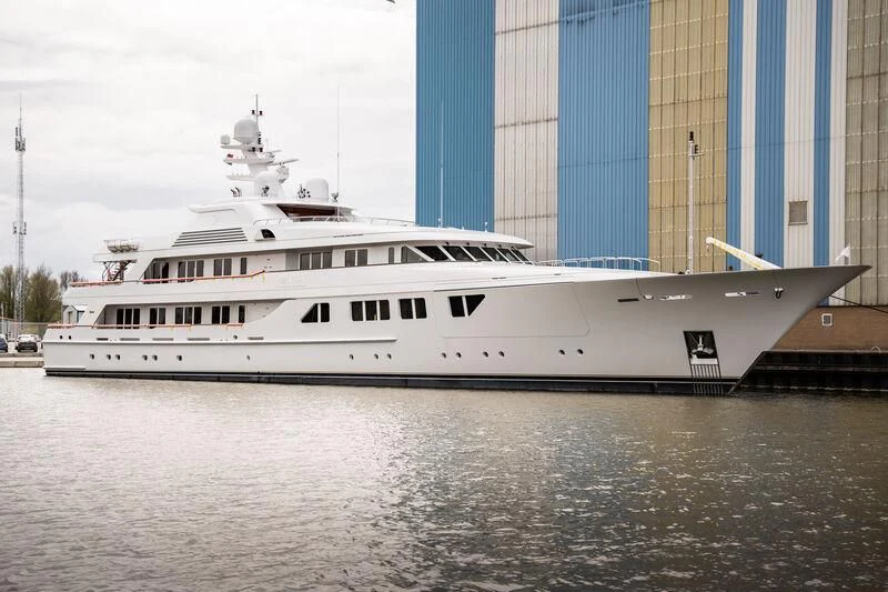 a large white boat in the water aboard NECTAR Yacht for Sale