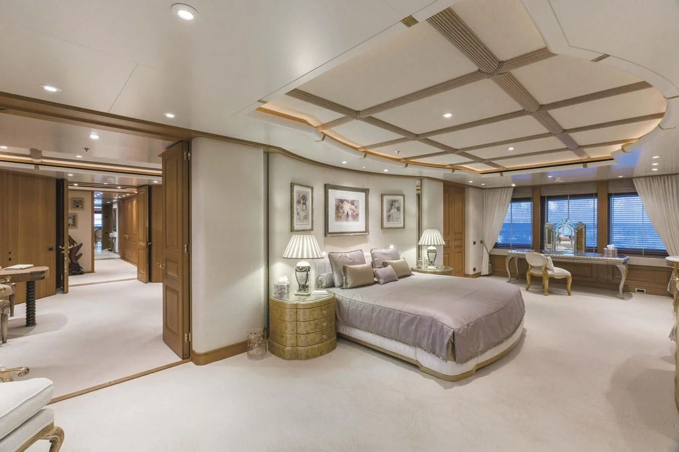 a large bedroom with a large bed aboard NECTAR Yacht for Sale