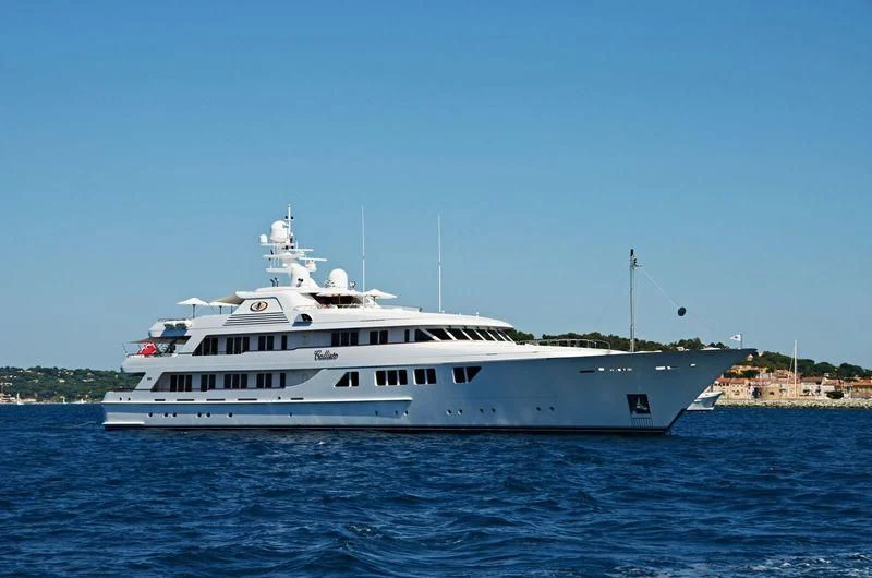 a white boat in the water aboard NECTAR Yacht for Sale
