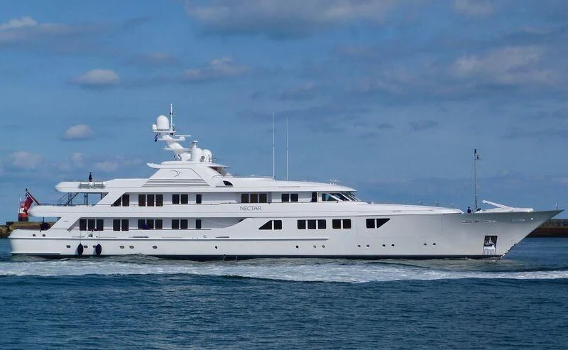 a large white boat in the water aboard NECTAR Yacht for Sale