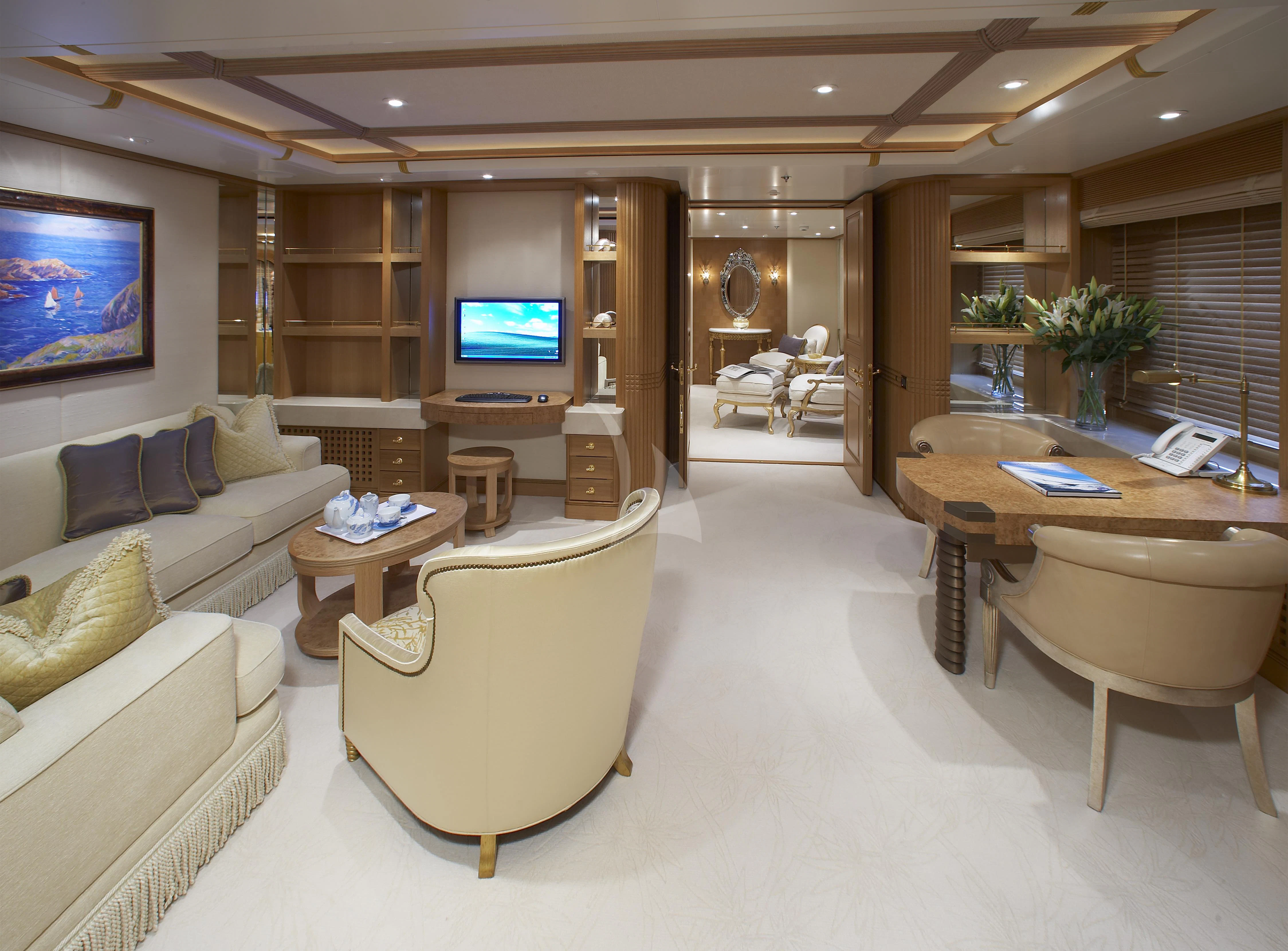 a living room with a large mirror aboard NECTAR Yacht for Sale