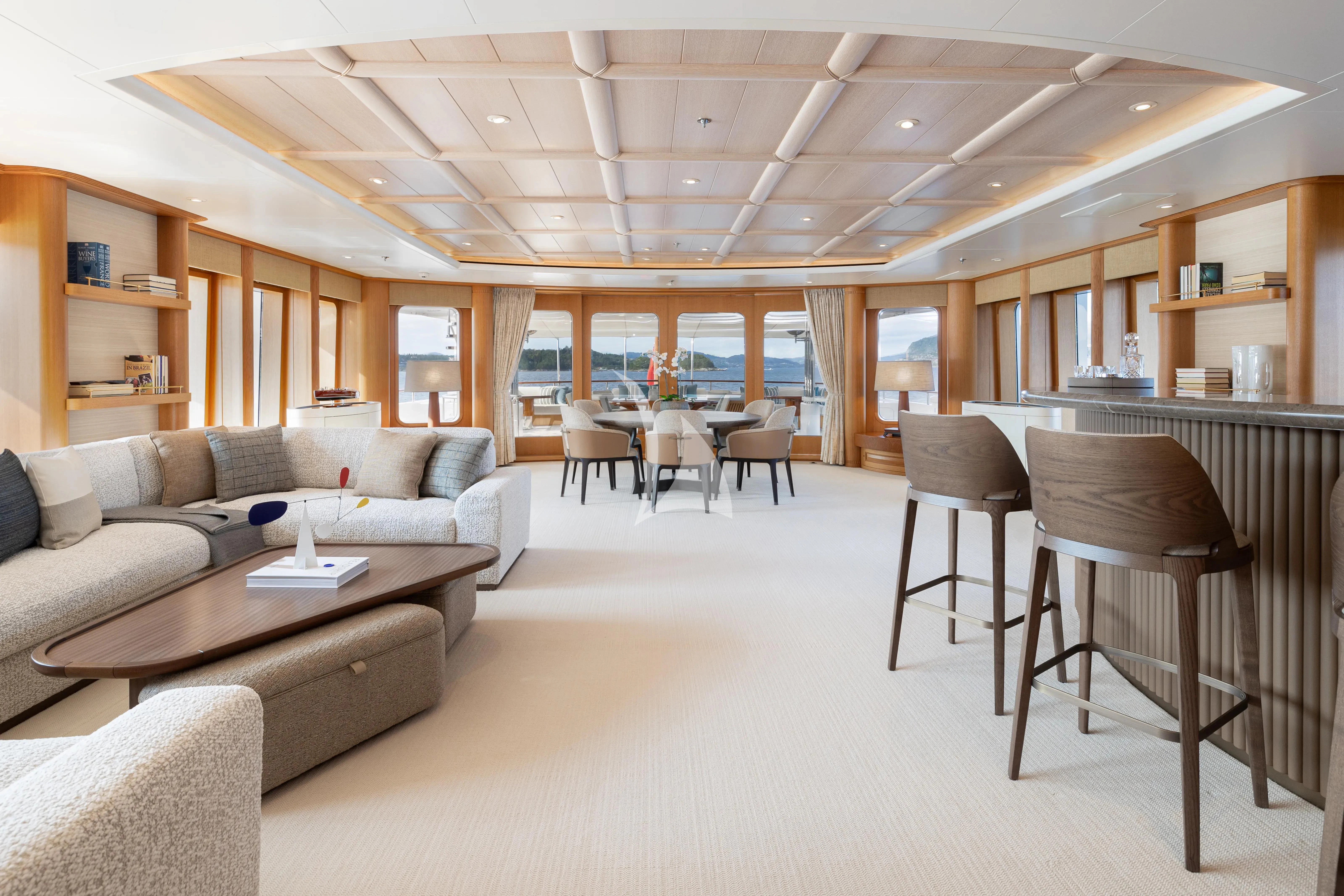 a living room with a couch and a table aboard NECTAR Yacht for Sale