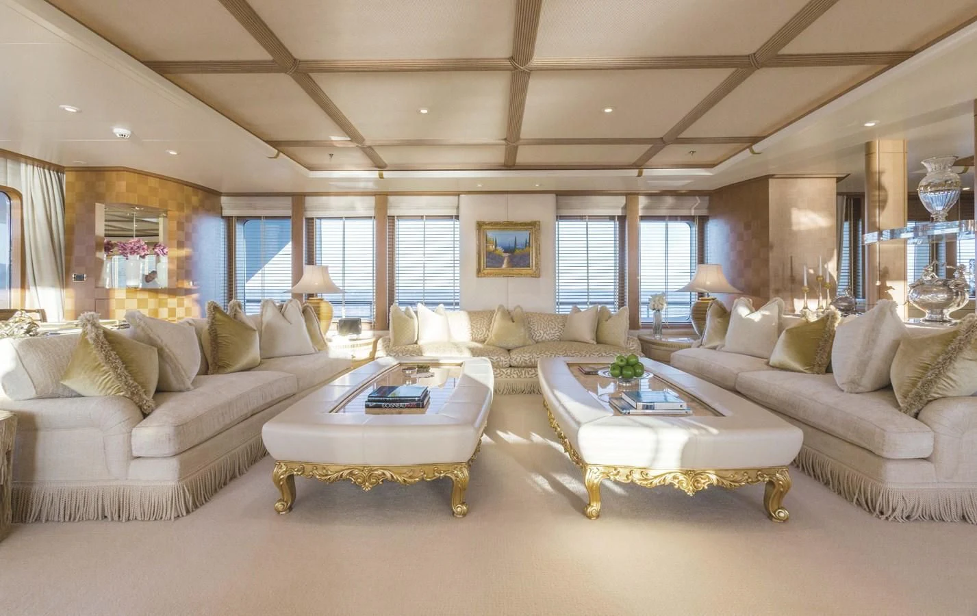 a living room with a couch and a coffee table aboard NECTAR Yacht for Sale