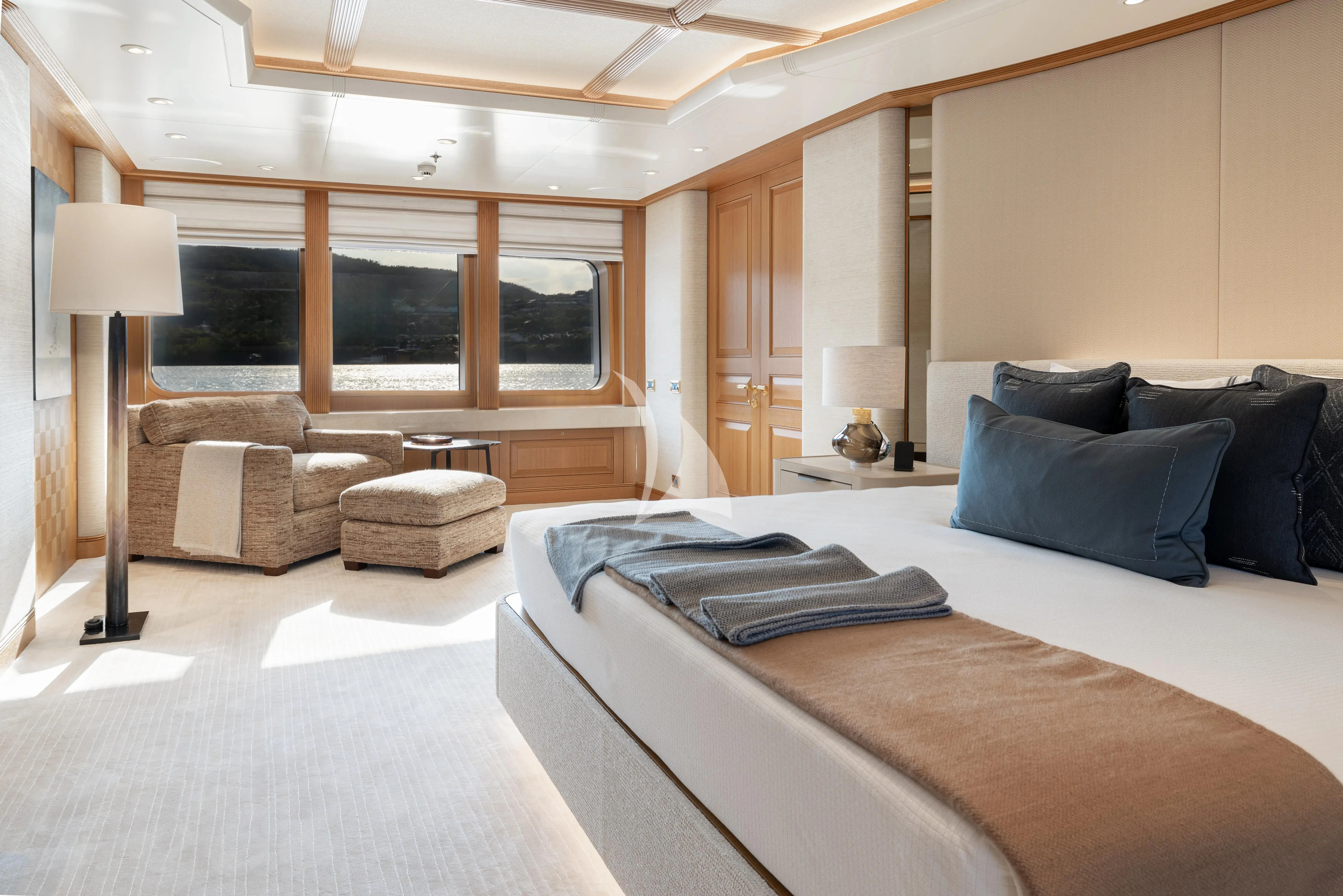 a large bed in a room aboard NECTAR Yacht for Sale