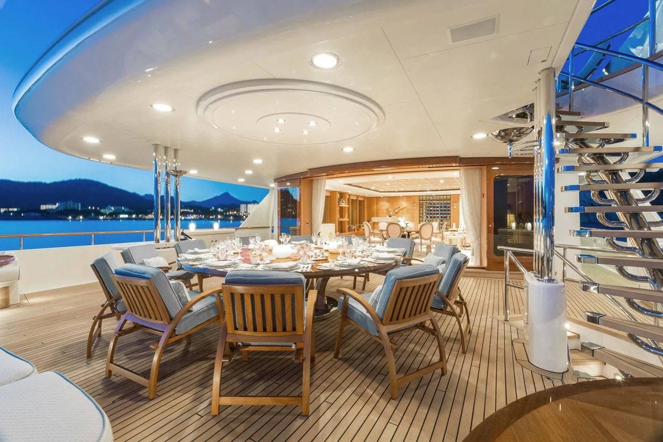 a room with tables and chairs aboard NECTAR Yacht for Sale