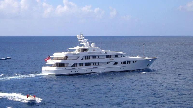 a white boat in the water aboard NECTAR Yacht for Sale