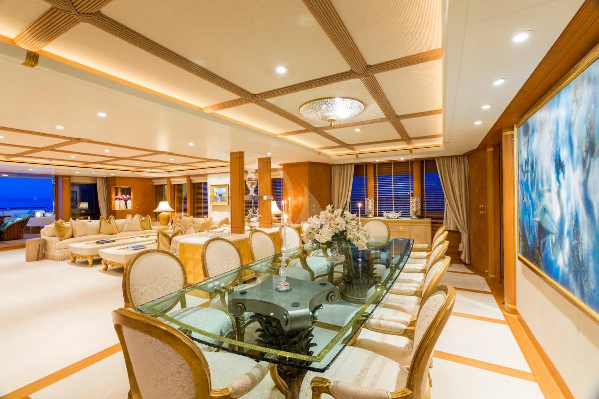 a room with a table and chairs aboard NECTAR Yacht for Sale