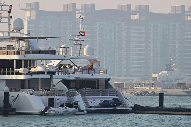 a boat docked at a pier aboard SIA Yacht for Sale