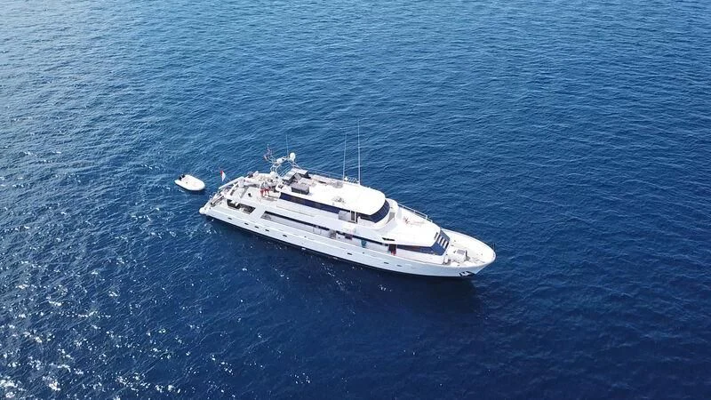 a white boat in the water aboard MARAM Yacht for Sale