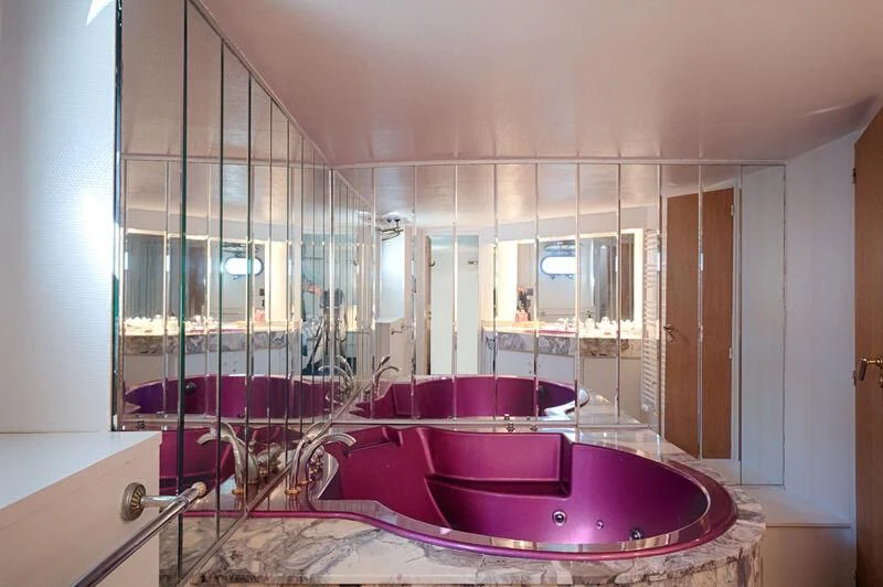 a large jacuzzi in a bathroom aboard MARAM Yacht for Sale