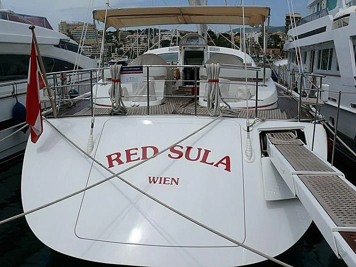 a boat docked at a pier aboard SUNLEIGH Yacht for Sale