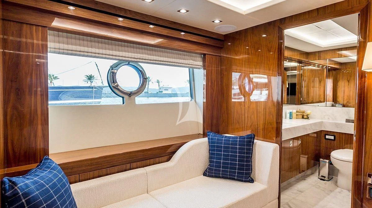 a room with a bed and a window aboard STARDUST OF MARY Yacht for Sale