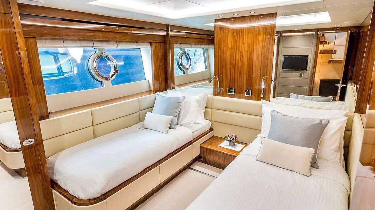 a room with two beds aboard STARDUST OF MARY Yacht for Sale