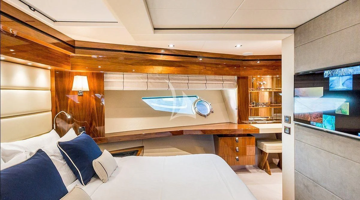 a room with a bed and a television aboard STARDUST OF MARY Yacht for Sale