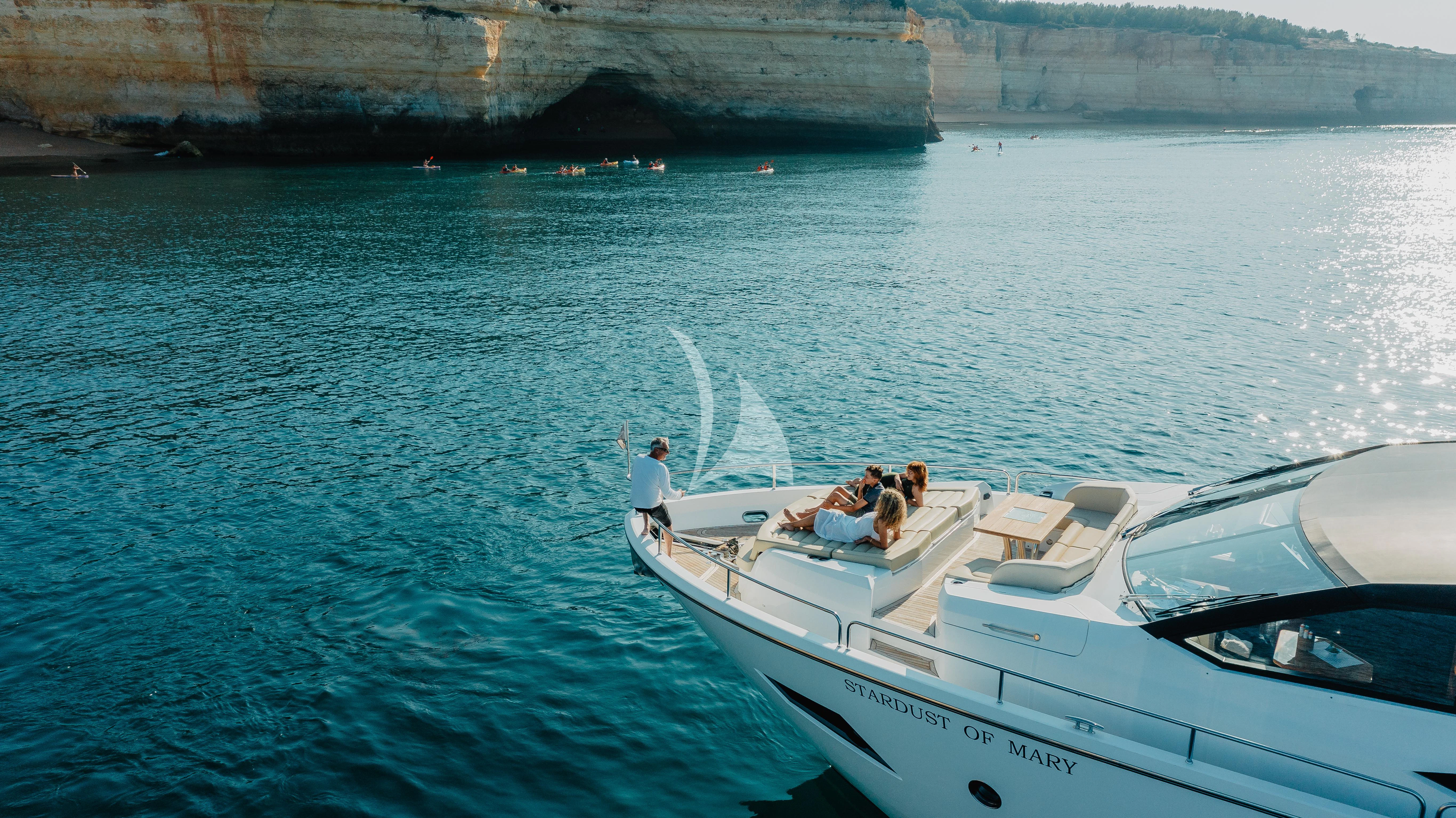 a group of people on a boat aboard STARDUST OF MARY Yacht for Sale
