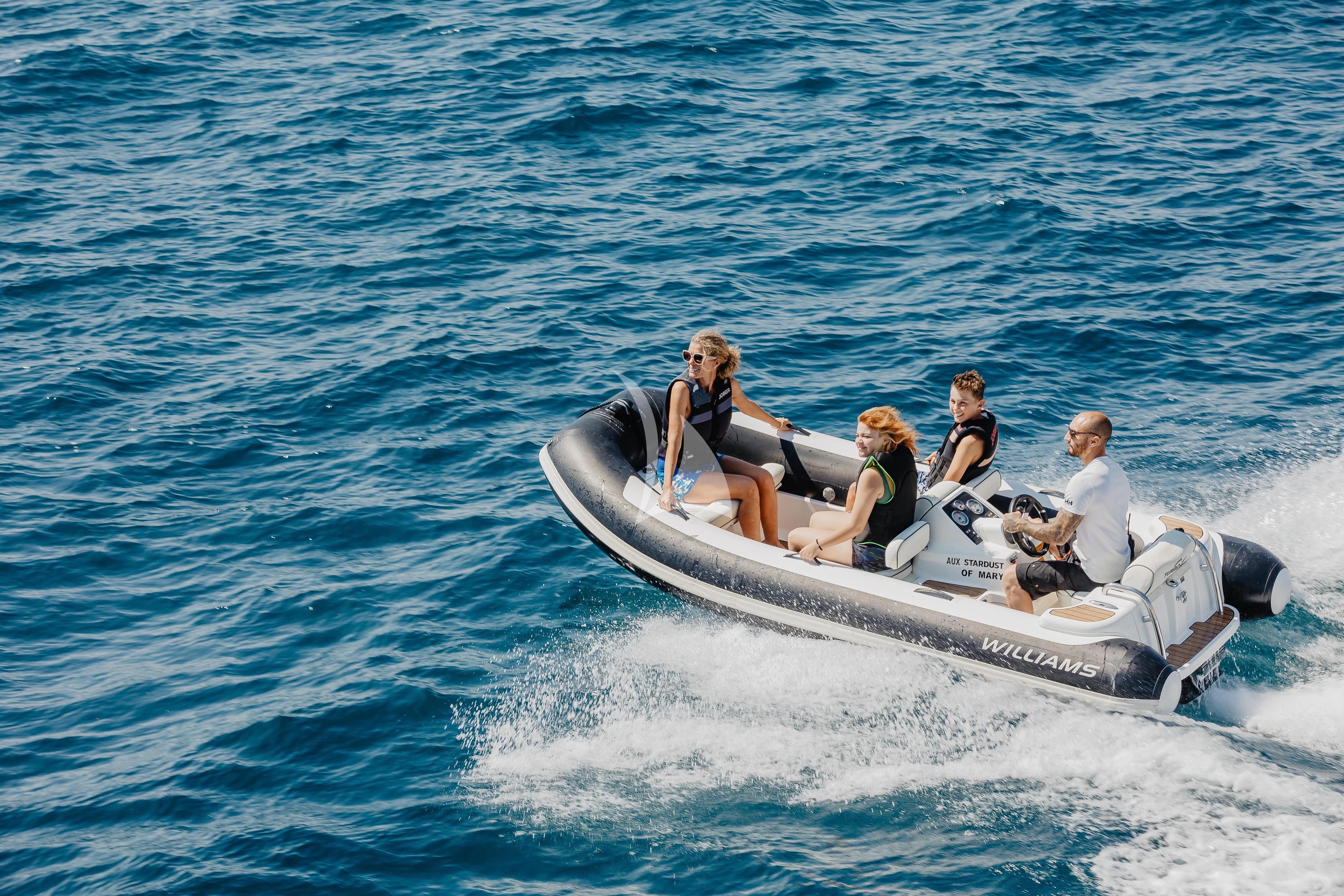 a group of people on a boat aboard STARDUST OF MARY Yacht for Sale