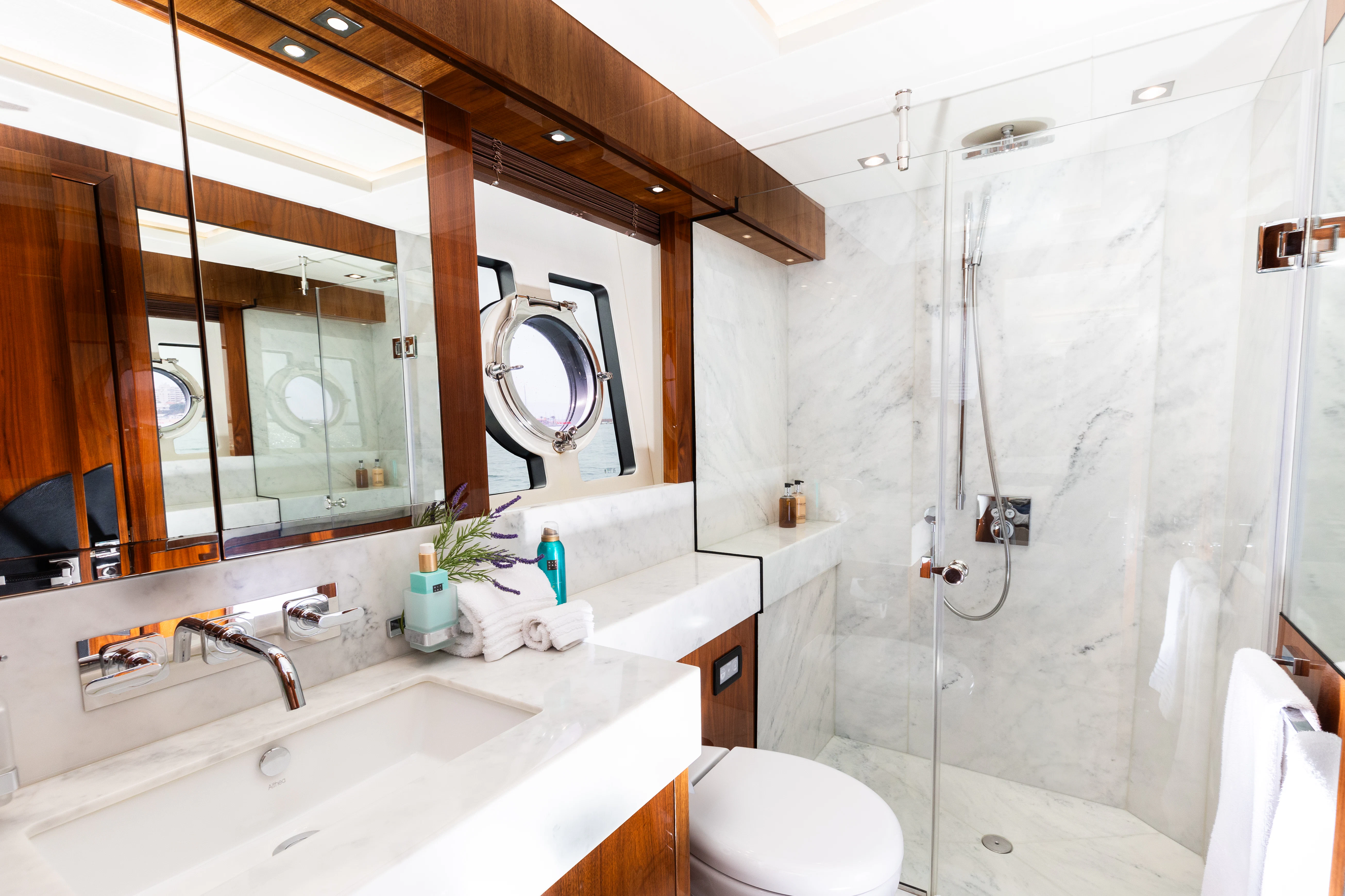 a bathroom with a shower and sink aboard STARDUST OF MARY Yacht for Sale