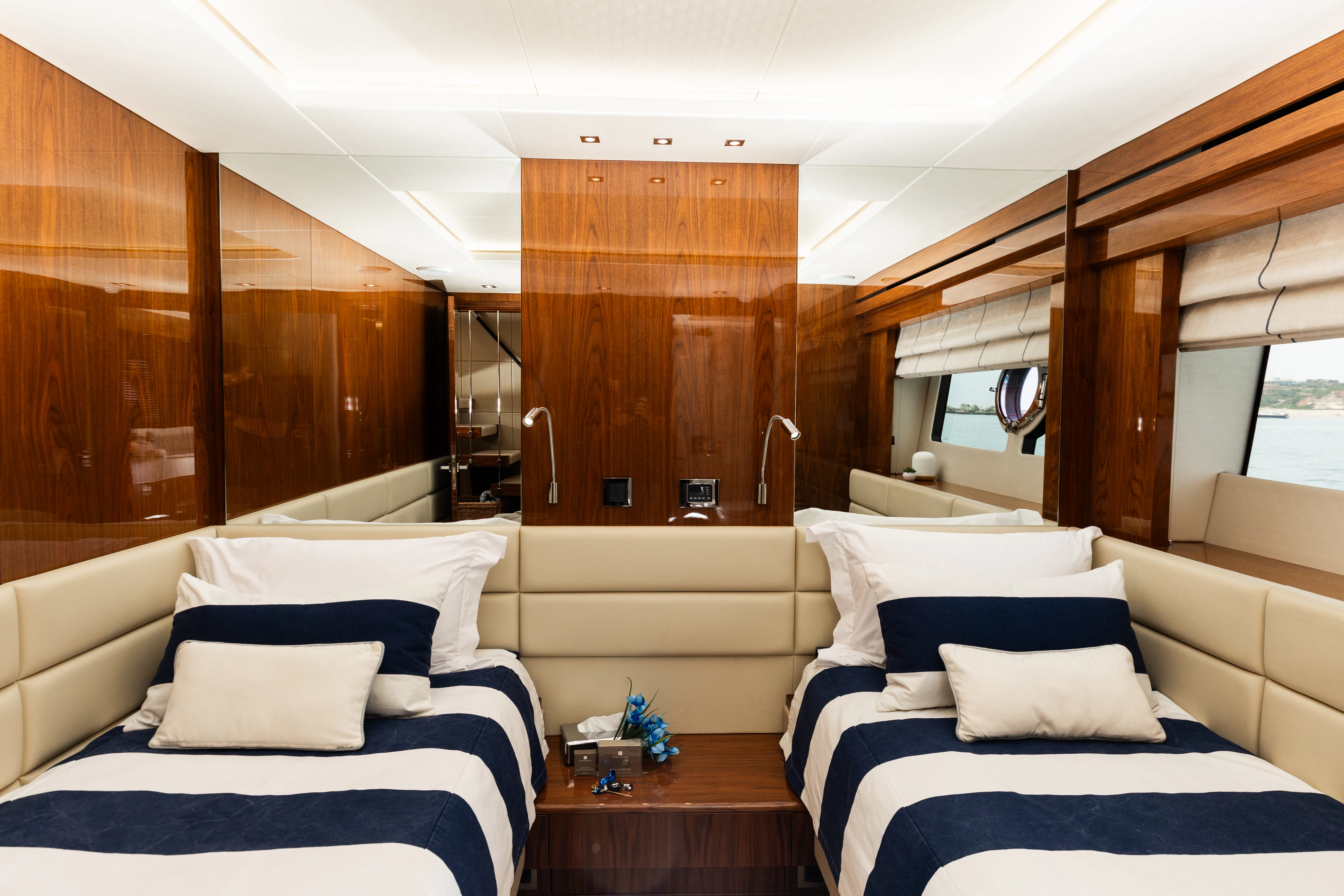 a room with a bed and a window aboard STARDUST OF MARY Yacht for Sale