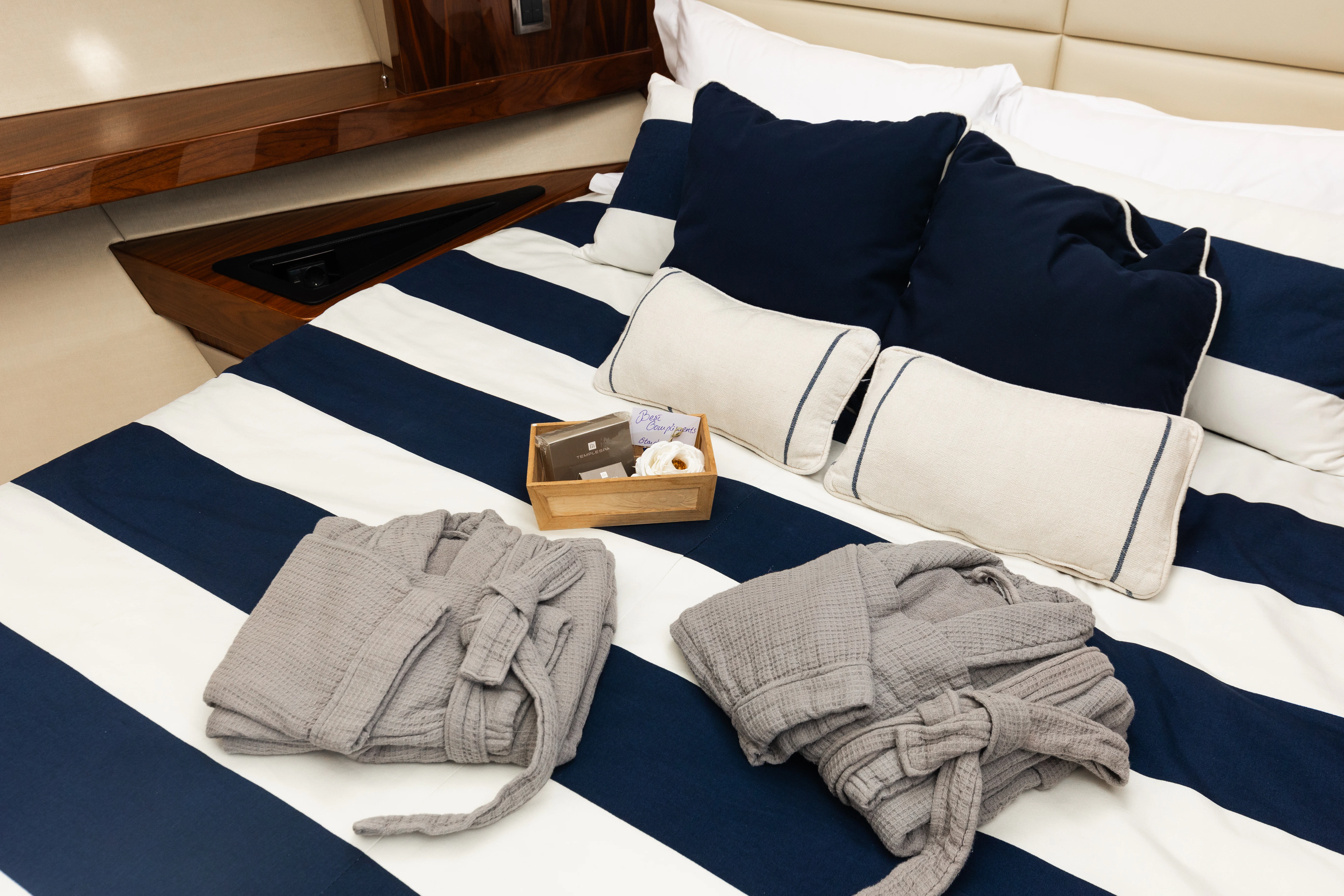 a bed with pillows and a pillow aboard STARDUST OF MARY Yacht for Sale