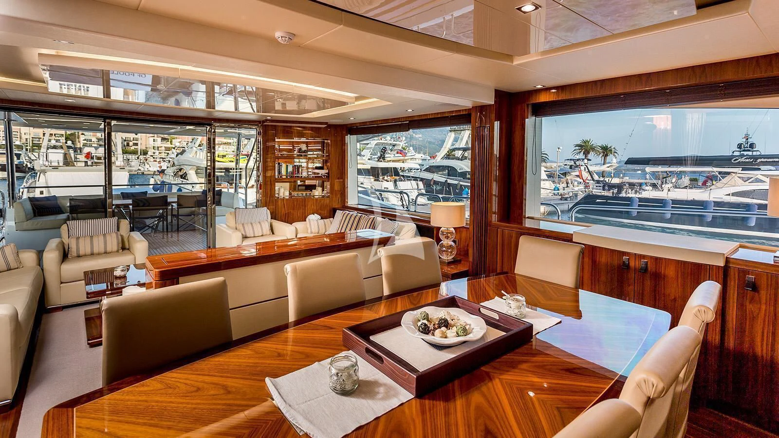 a room with a table and chairs aboard STARDUST OF MARY Yacht for Sale