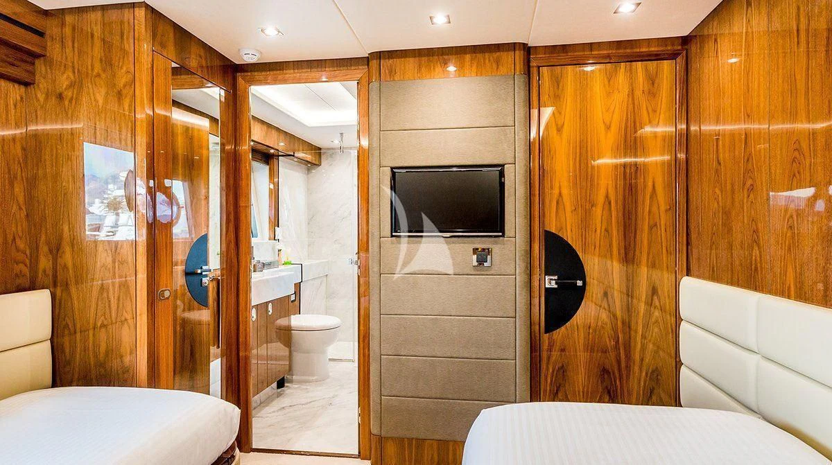 a bathroom with a wood cabinet aboard STARDUST OF MARY Yacht for Sale