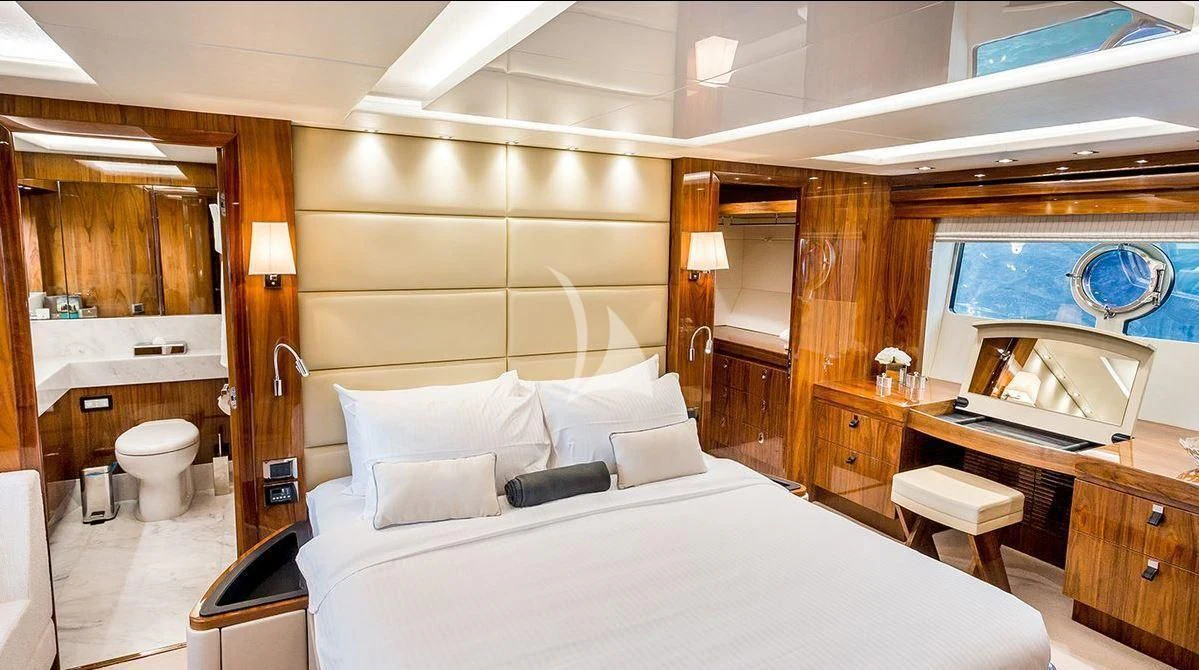 a hotel room with a bed and a sink aboard STARDUST OF MARY Yacht for Sale