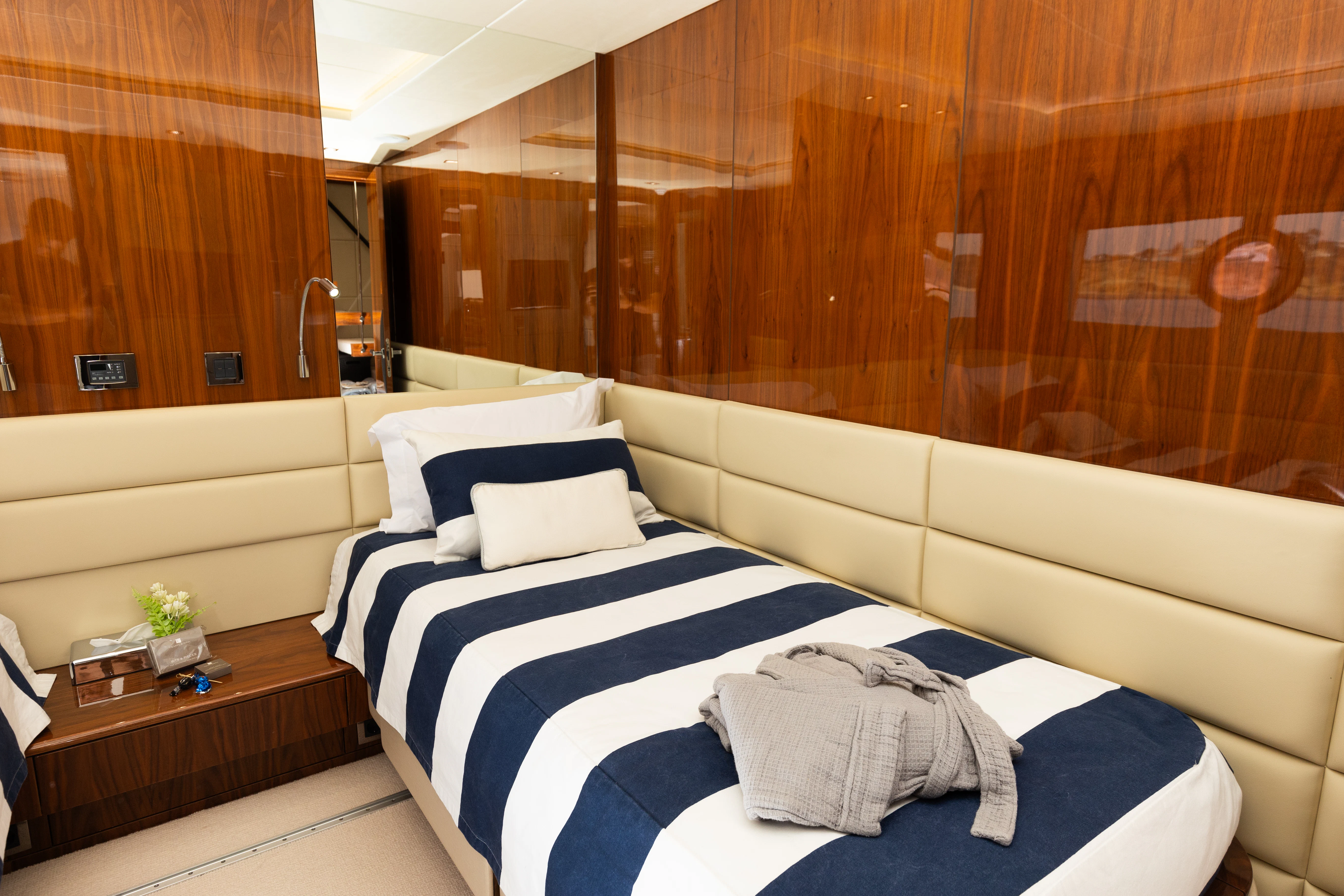 a room with a bed and a window aboard STARDUST OF MARY Yacht for Sale