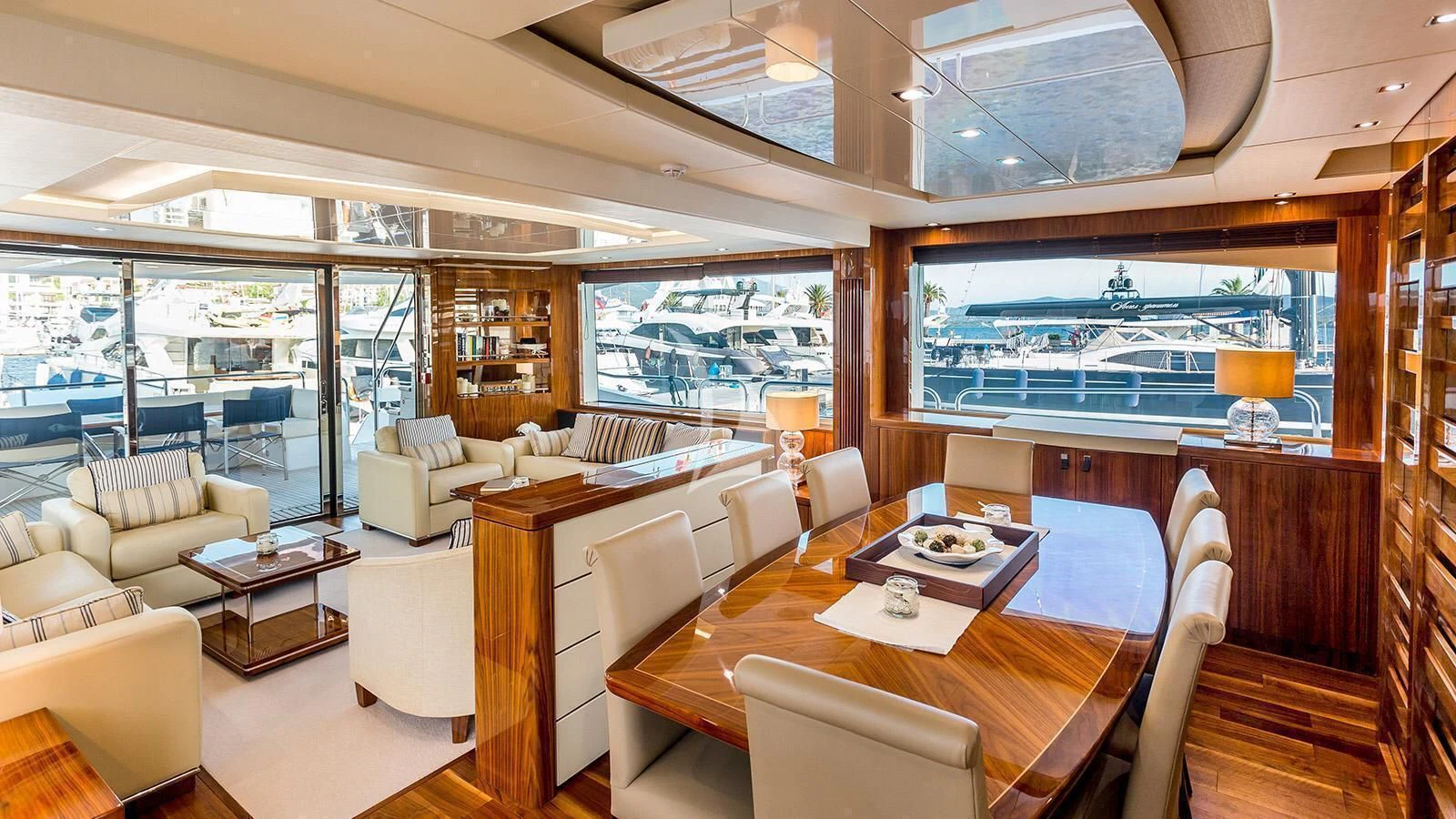 a living room with a large window aboard STARDUST OF MARY Yacht for Sale