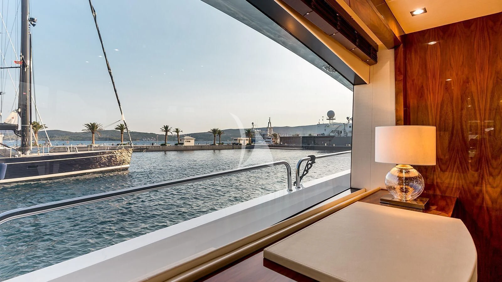 a large boat in a harbor aboard STARDUST OF MARY Yacht for Sale