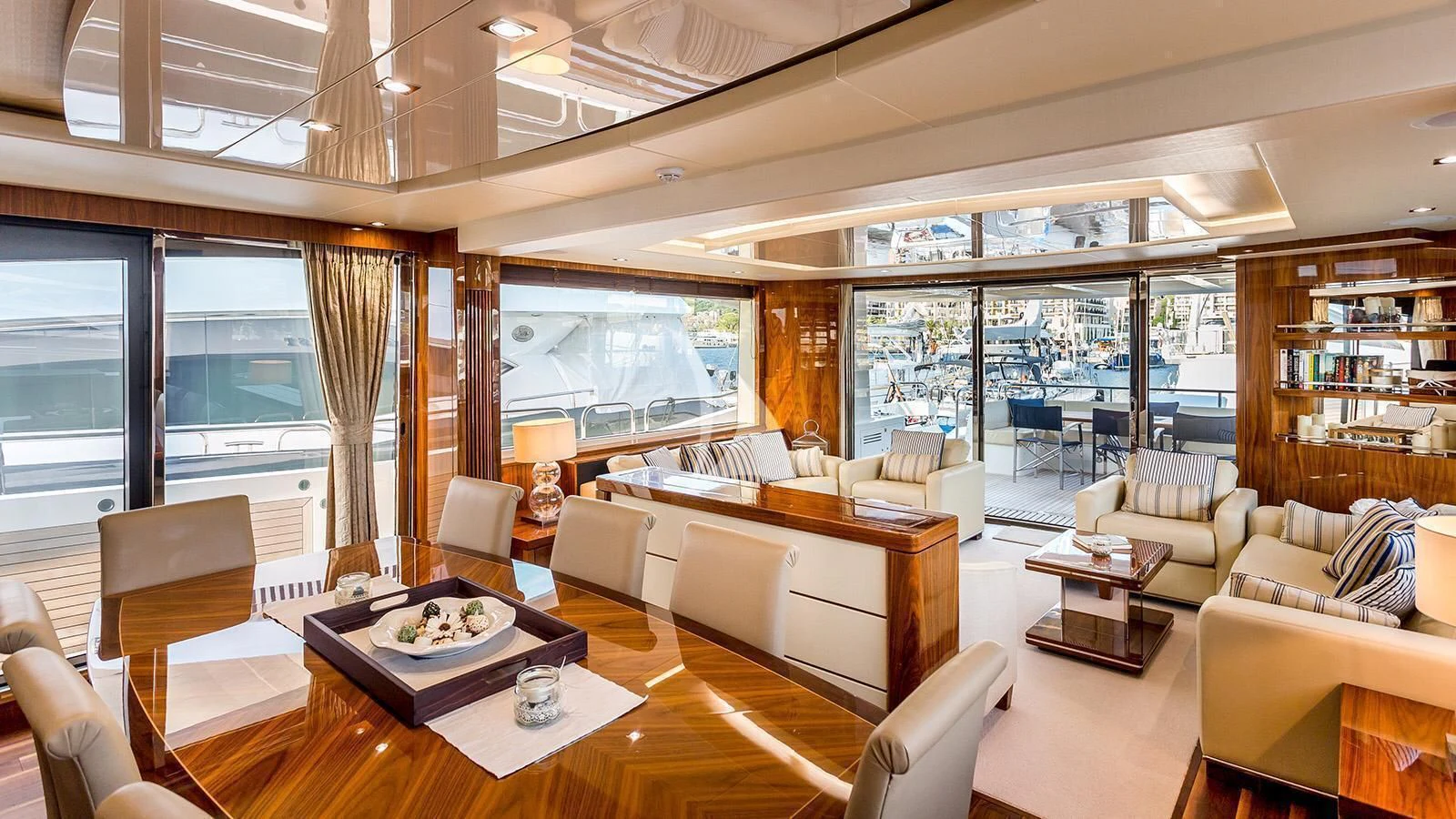 a living room with a large window aboard STARDUST OF MARY Yacht for Sale