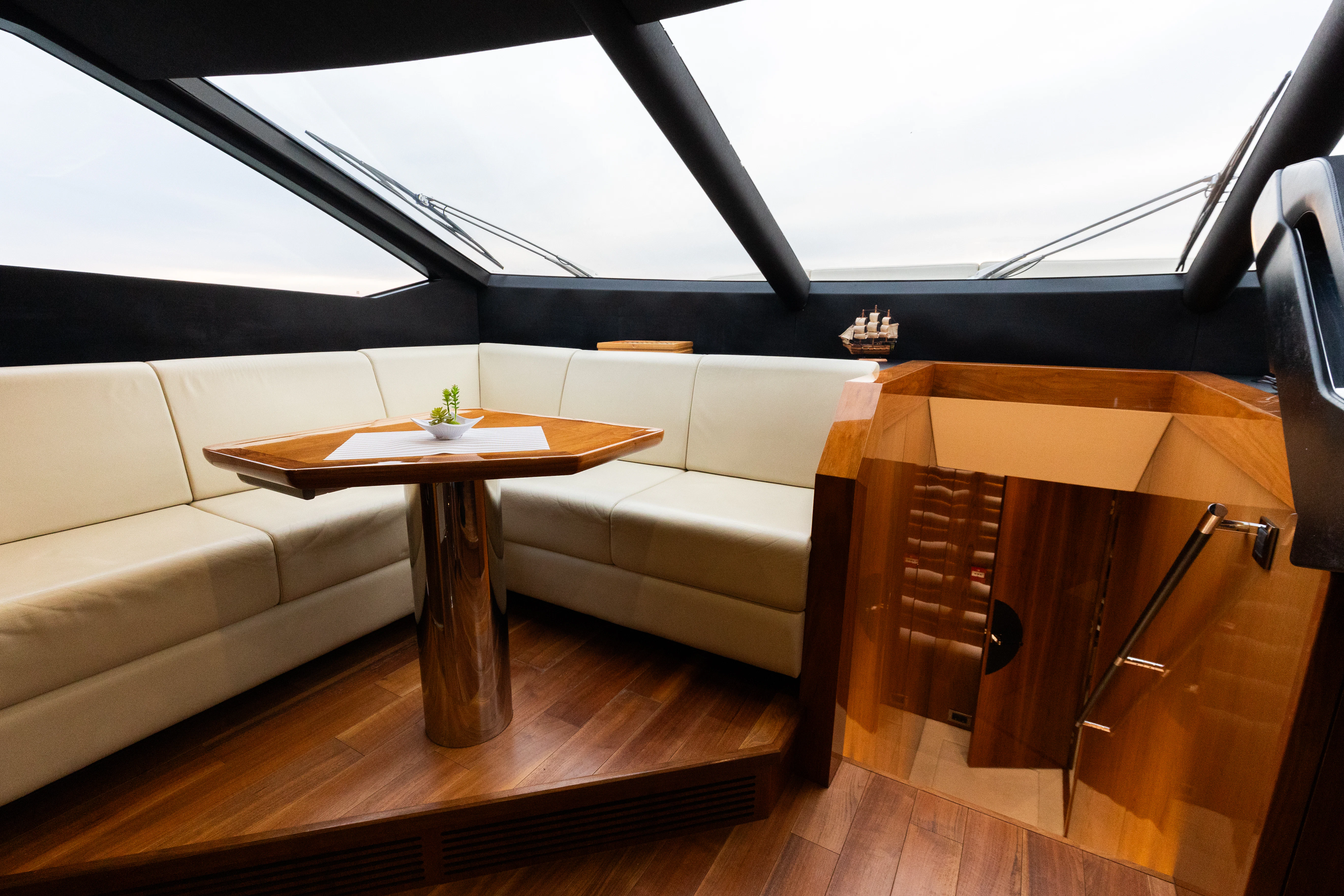 a living room with a couch and a coffee table aboard STARDUST OF MARY Yacht for Sale