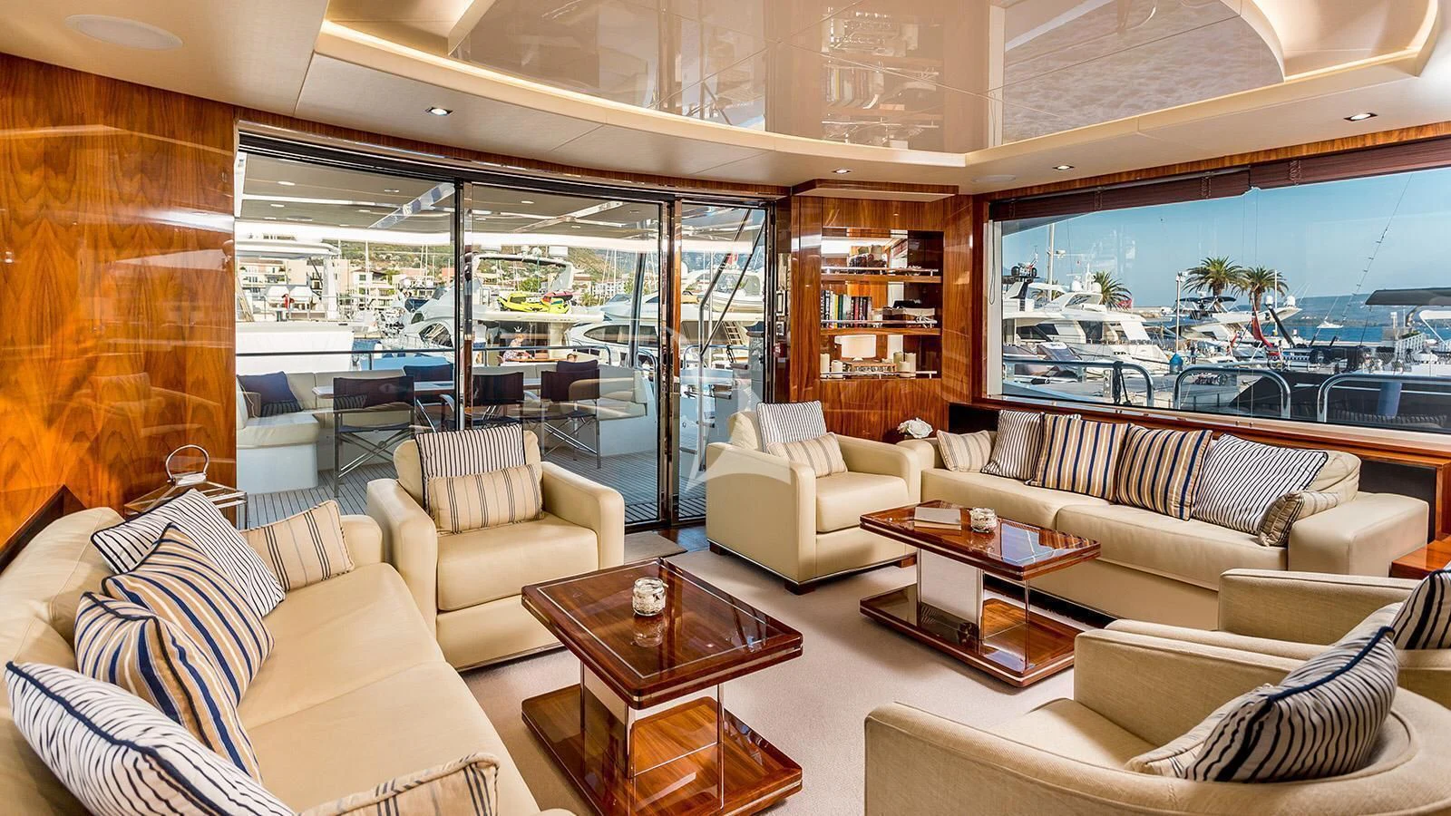 a living room with a large window aboard STARDUST OF MARY Yacht for Sale