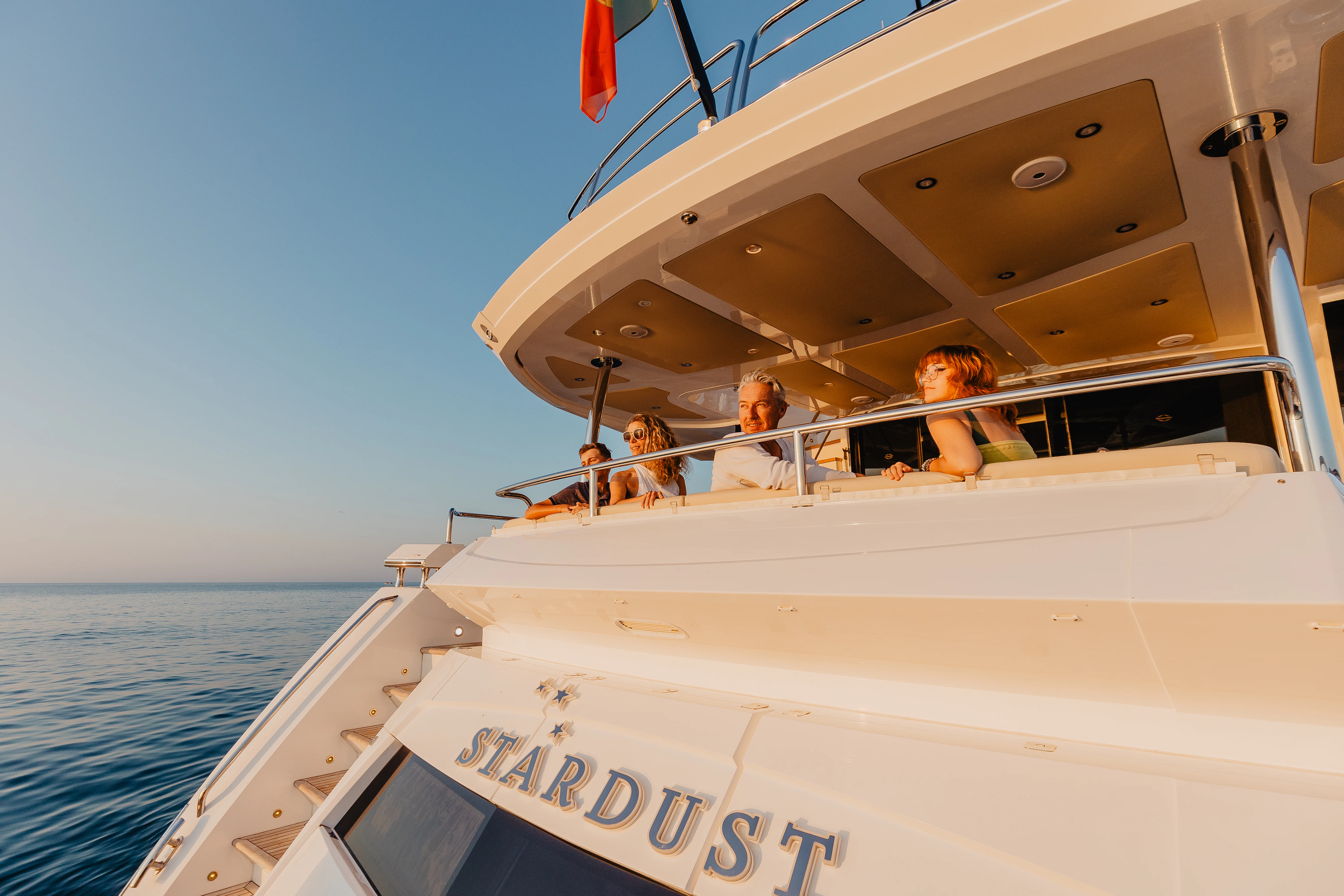 a group of people on a boat aboard STARDUST OF MARY Yacht for Sale