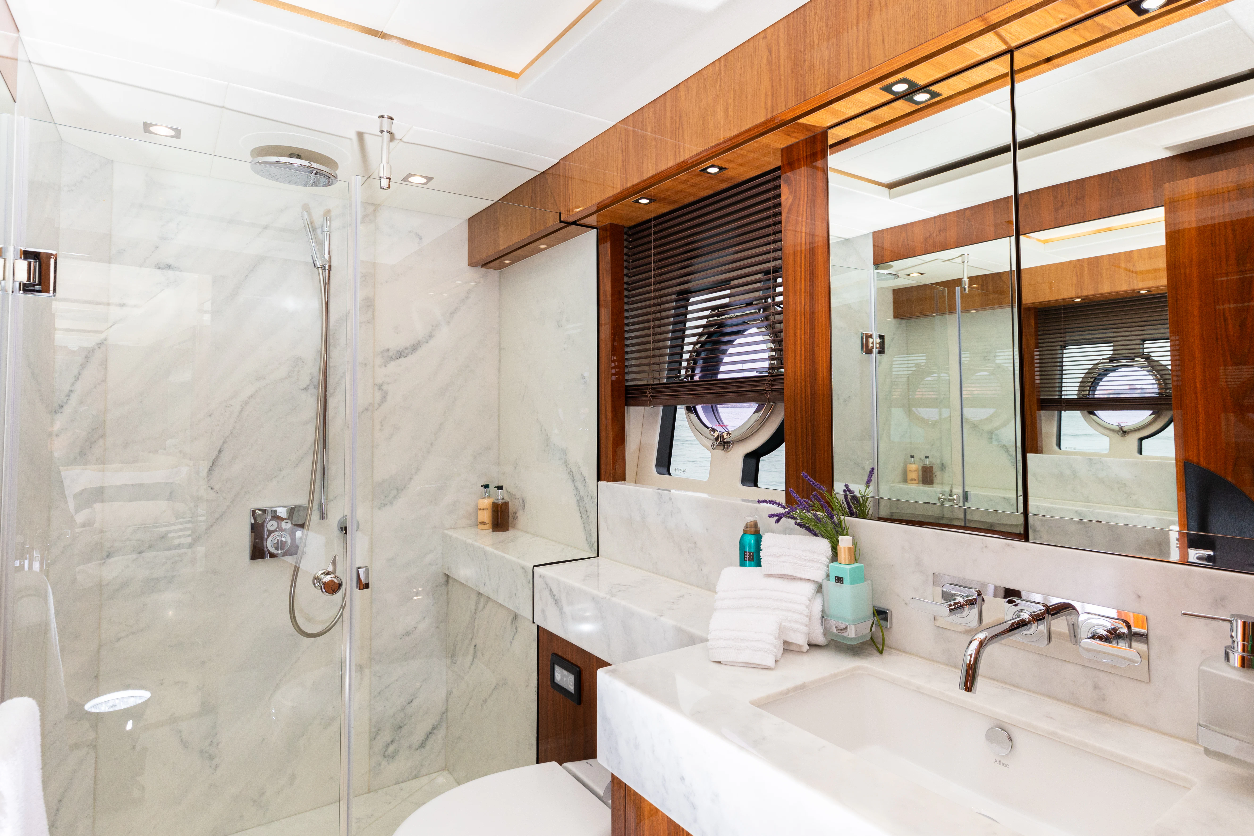 a bathroom with a glass shower aboard STARDUST OF MARY Yacht for Sale