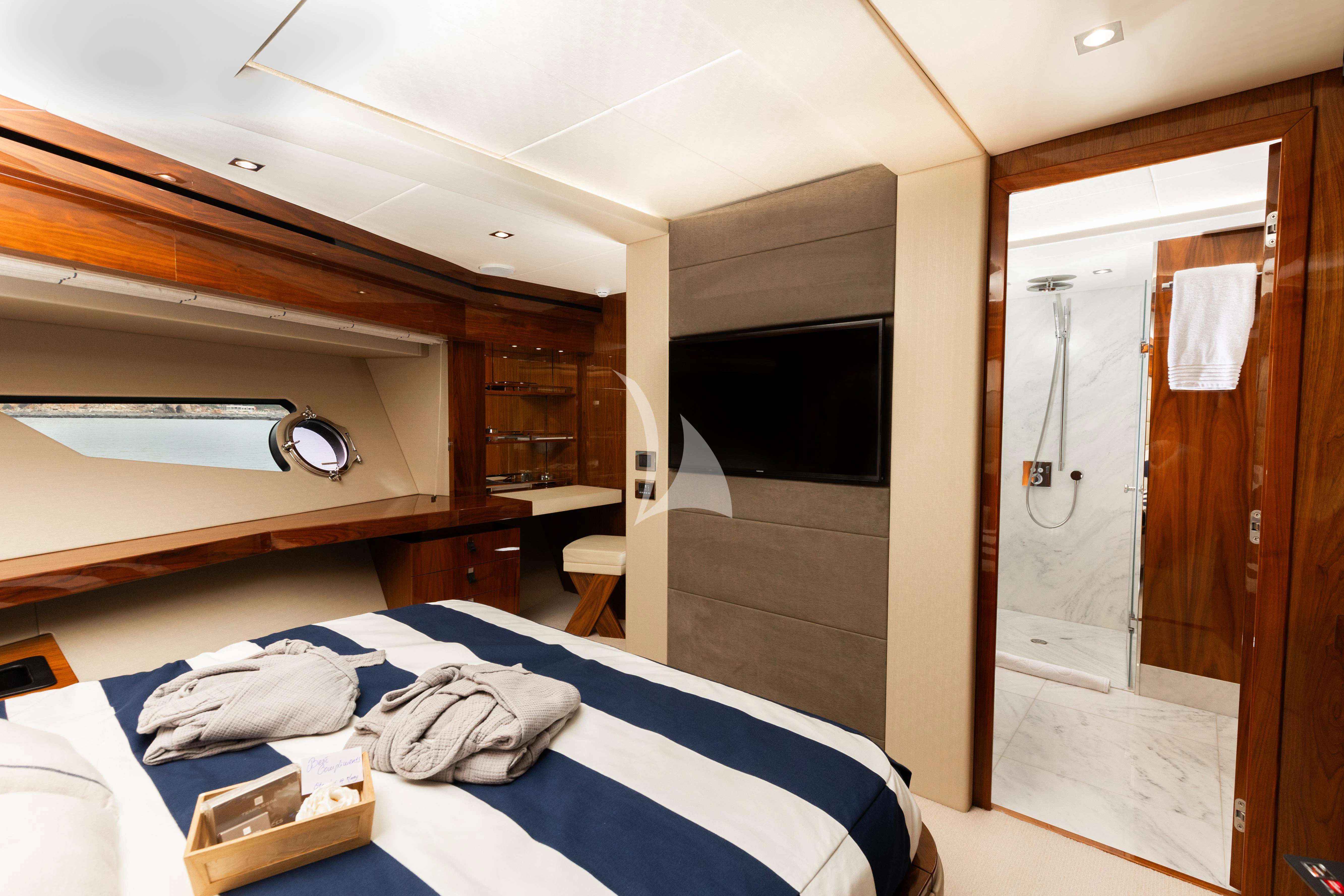 a bedroom with a bed and a closet aboard STARDUST OF MARY Yacht for Sale