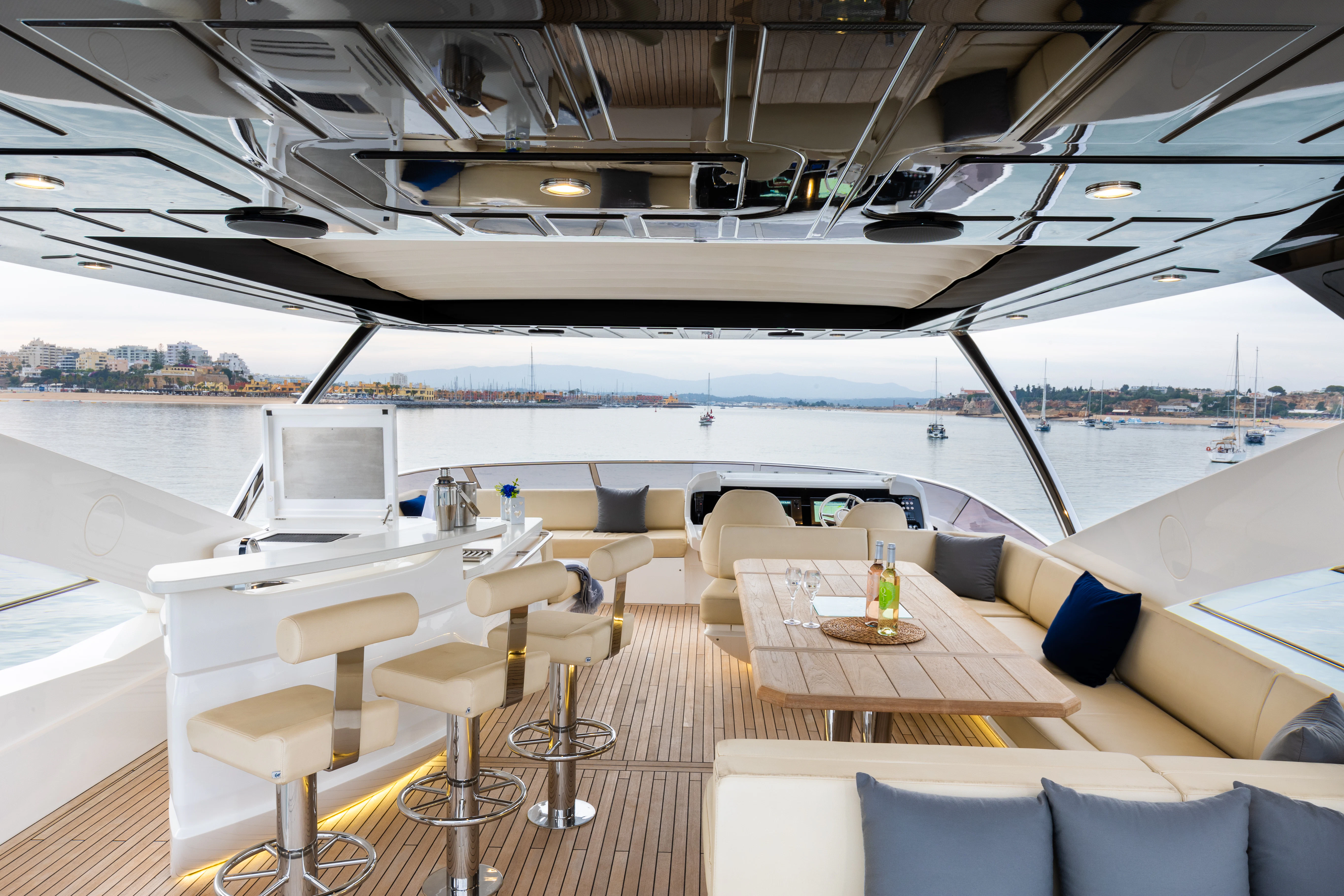 a room with a table and chairs aboard STARDUST OF MARY Yacht for Sale