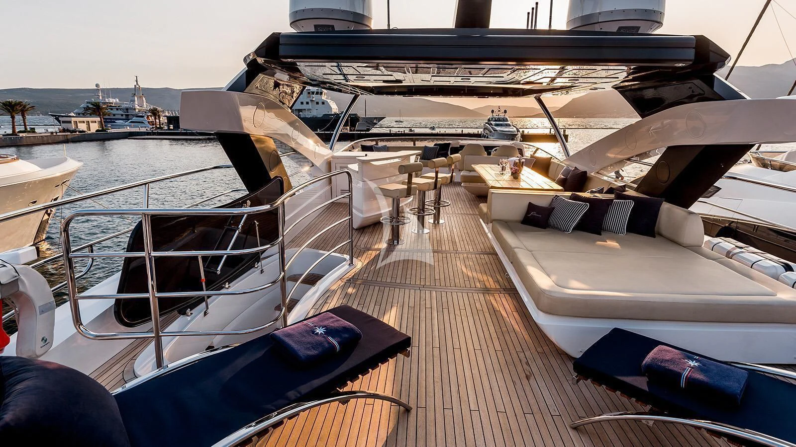 a deck with a deck and boats on it aboard STARDUST OF MARY Yacht for Sale