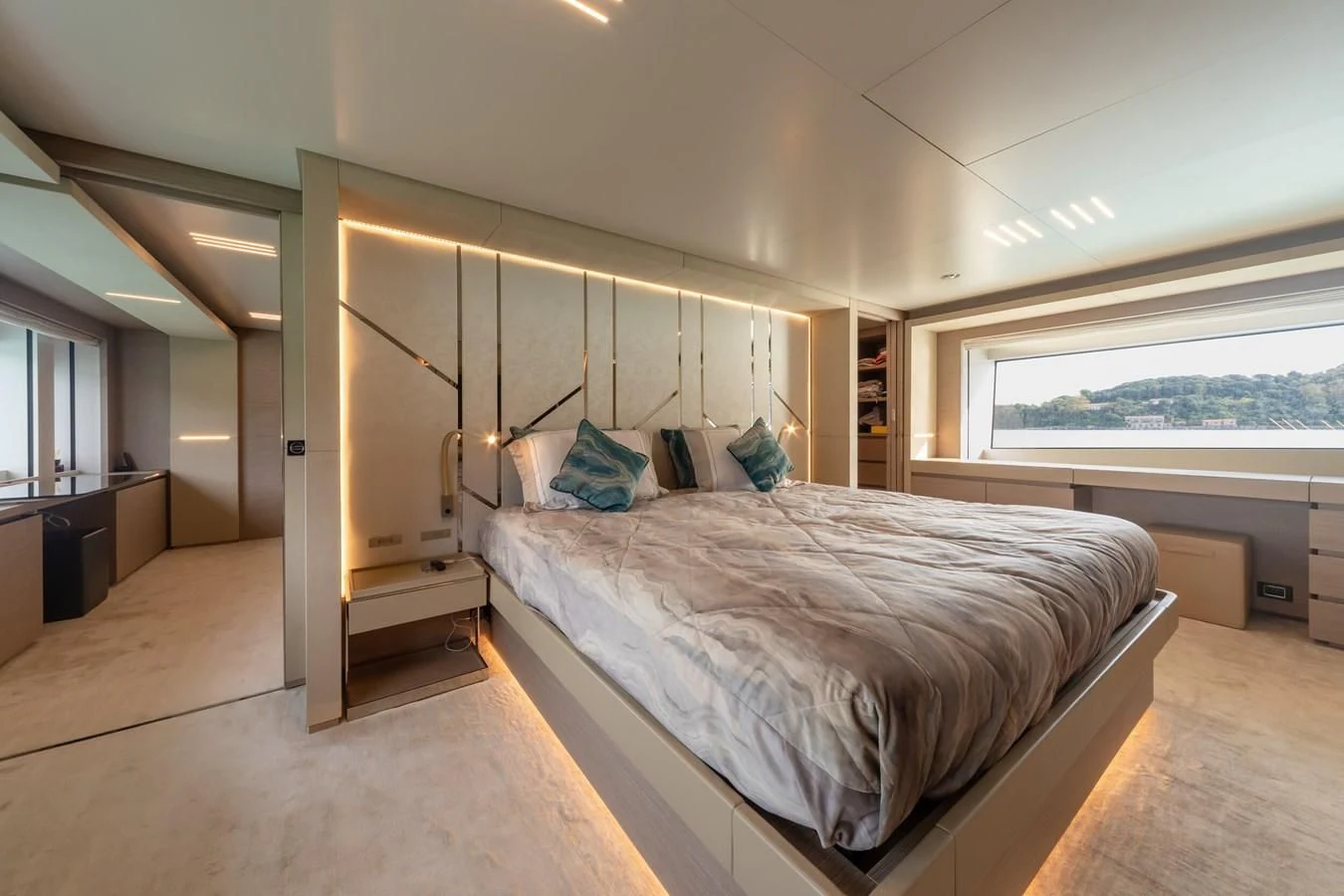 a large bedroom with a large bed aboard FRANGELO Yacht for Sale