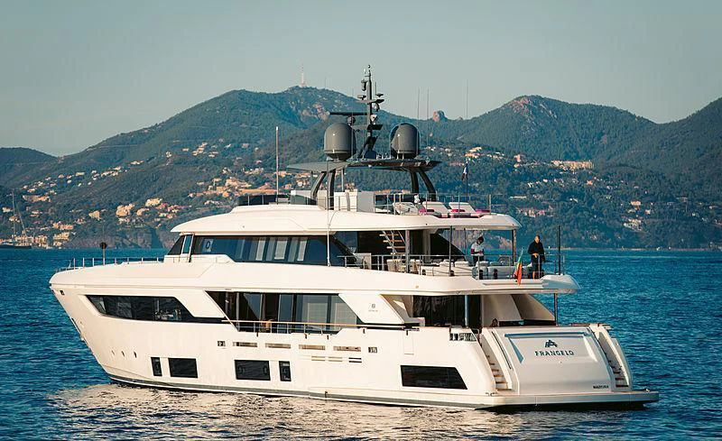 a white yacht in the water aboard FRANGELO Yacht for Sale