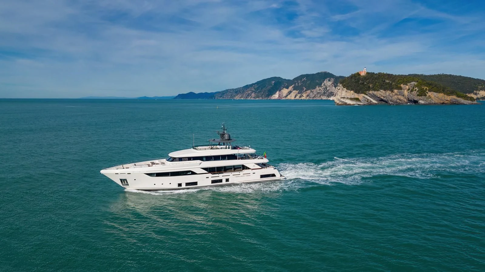 a white yacht in the water aboard FRANGELO Yacht for Sale