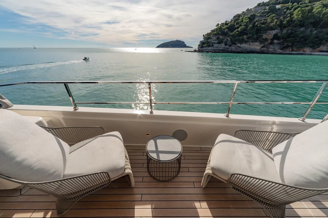 a deck overlooking a body of water aboard FRANGELO Yacht for Sale