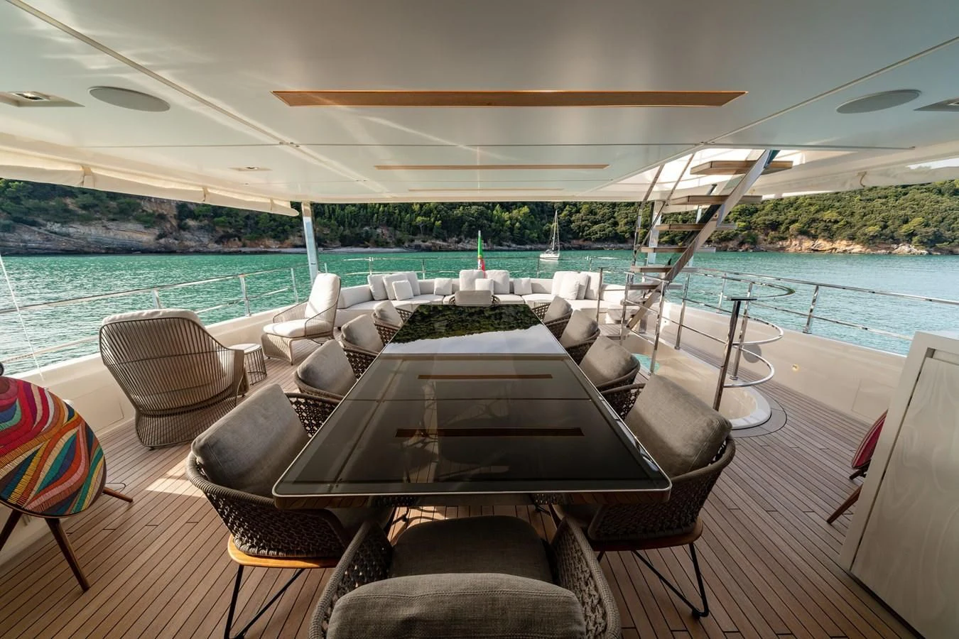 a large living room with a large pool aboard FRANGELO Yacht for Sale