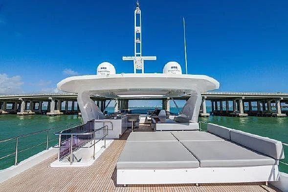 a large white building with a dome roof and a dome on top aboard LUCKY 7 Yacht for Sale
