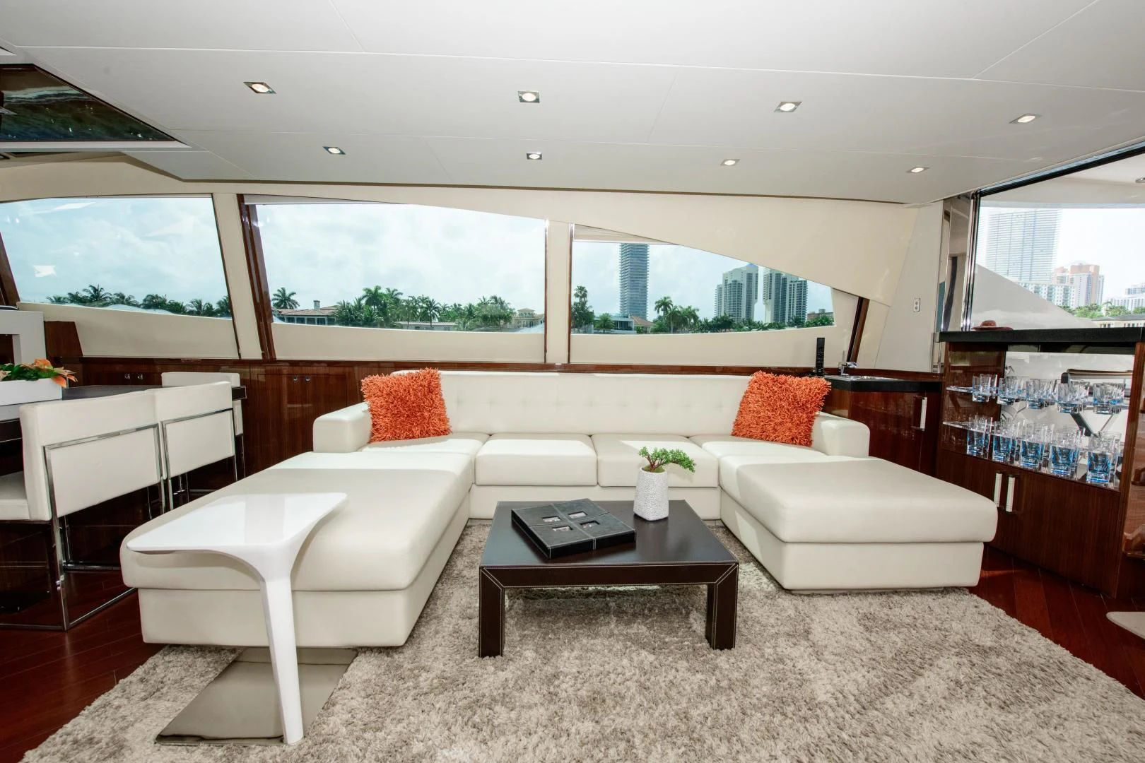 a living room with a couch and a coffee table aboard CHAPTER II Yacht for Sale