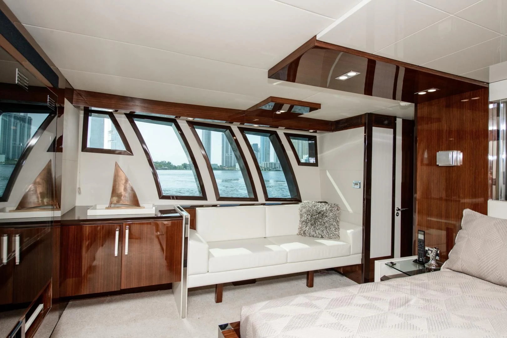 a room with a bed and a desk aboard CHAPTER II Yacht for Sale