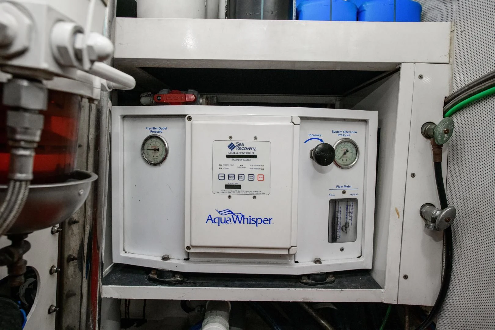 a white machine with a label on it aboard CHAPTER II Yacht for Sale