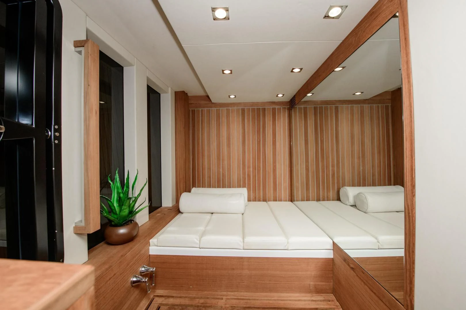 a room with a couch and a table aboard CHAPTER II Yacht for Sale